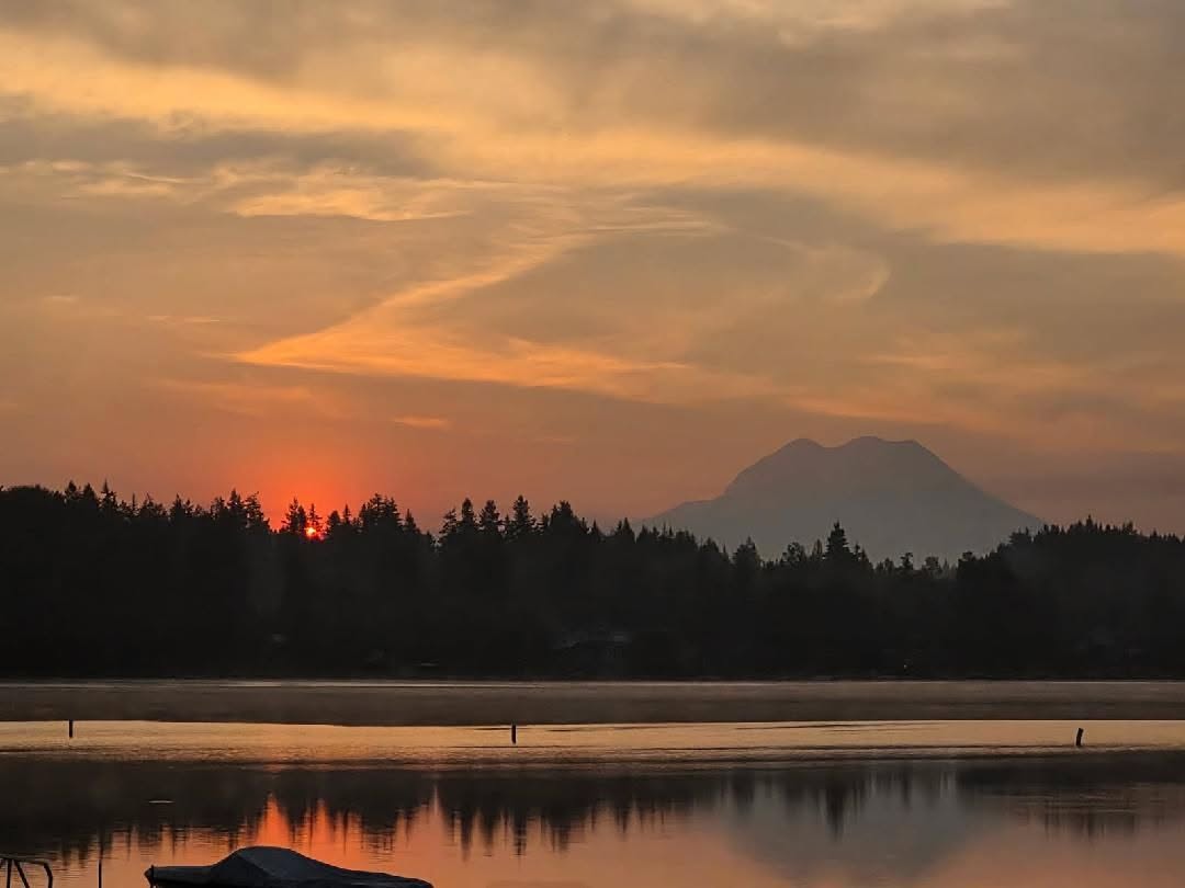 Sunset over Lake Lawrence with Mount Rainier in the distance